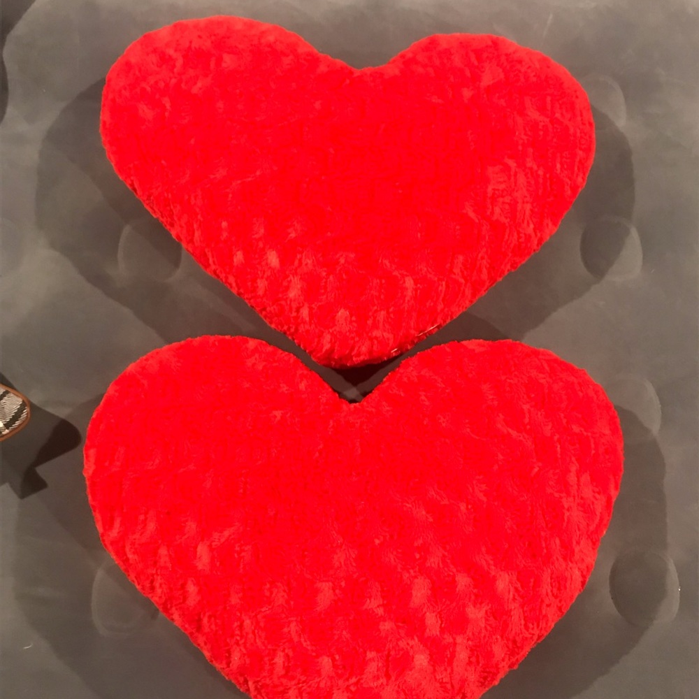 Two adorable puffed heart pillows from target